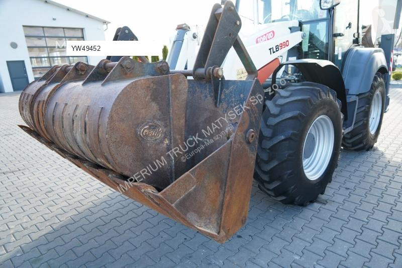 Traktor med grab Terex TLB 990