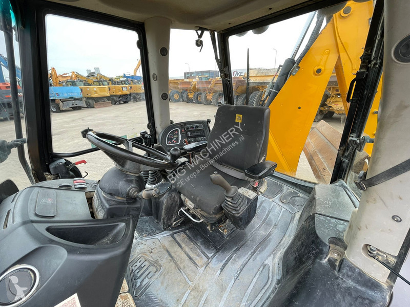 Traktor med grab JCB