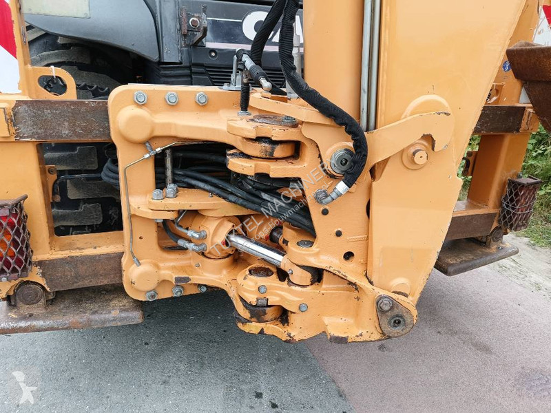 Traktor med grab Case backhoe loader graaf laad...