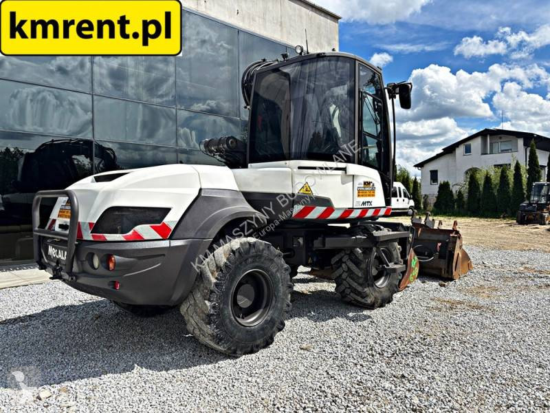 Багер-товарач Mecalac 12 MTX KOPARKO-ŁADOWARKA...