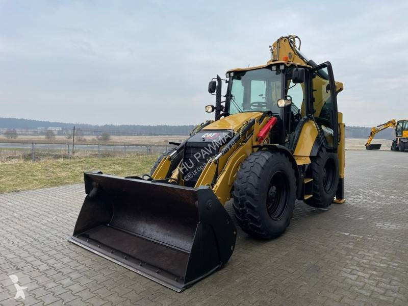 Traktor med grab Caterpillar 444 F2