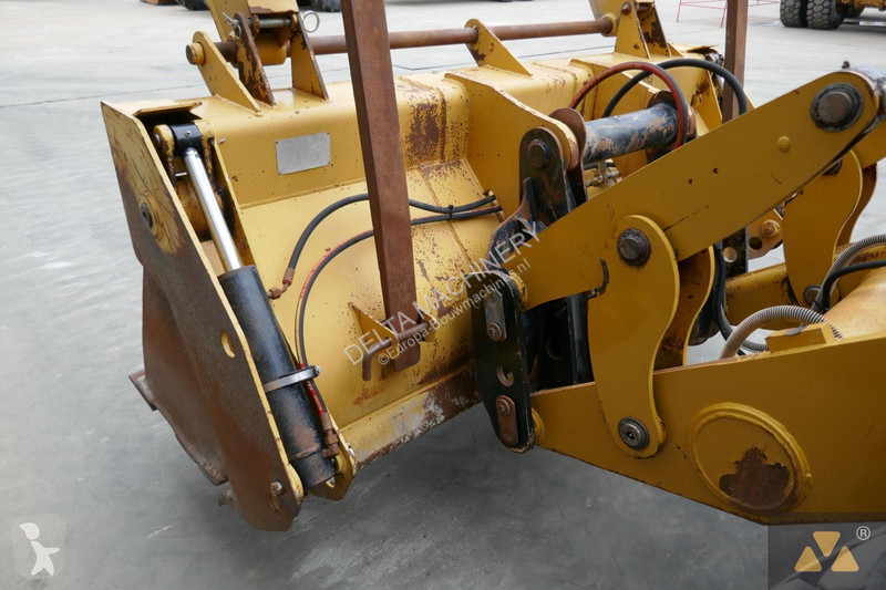 Traktor med grab Caterpillar 444F