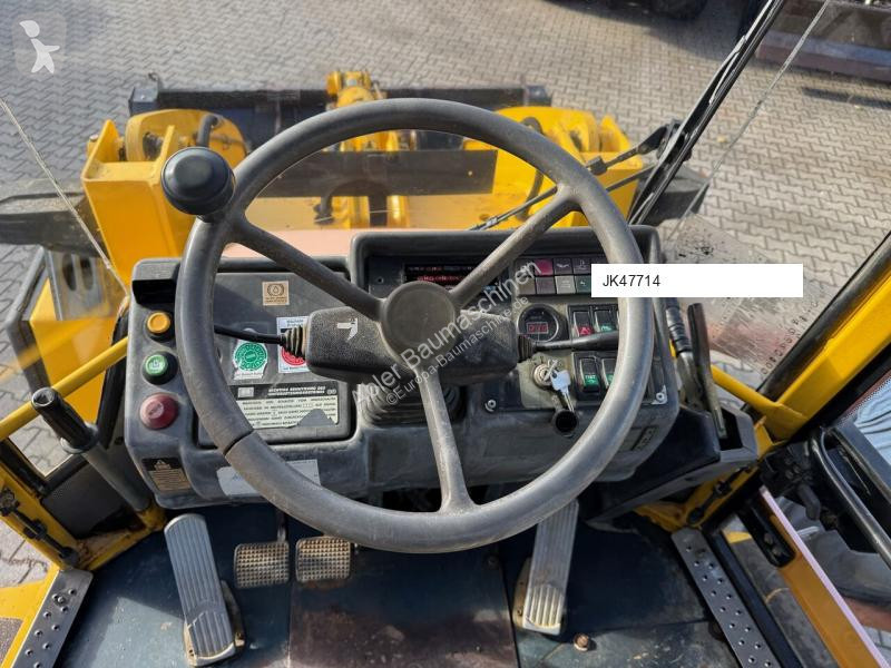 Traktor med grab Komatsu