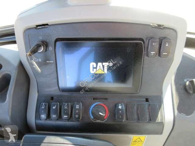 Traktor med grab Caterpillar 432