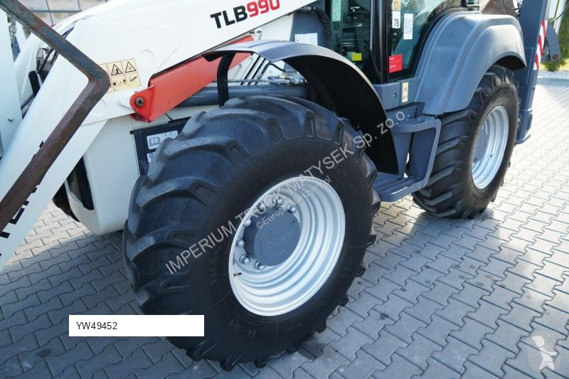 Traktor med grab Terex TLB 990
