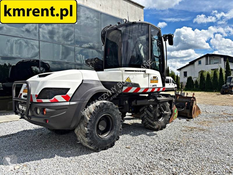 Koparko-ładowarka Mecalac 12 MTX...