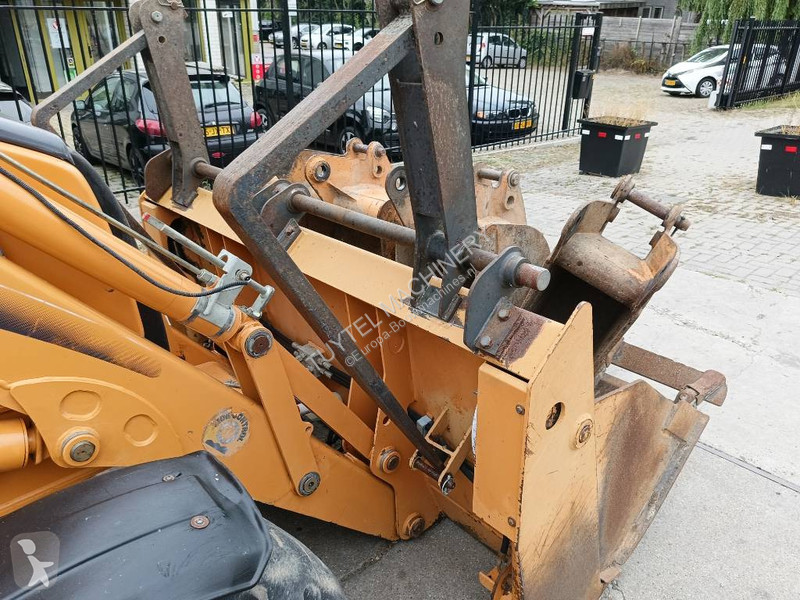 Traktor med grab Case backhoe loader graaf laad...