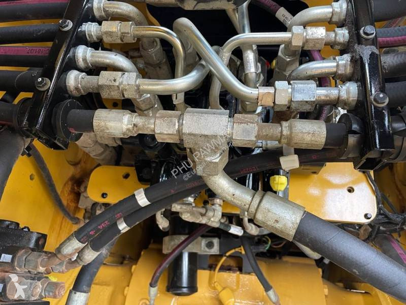 Traktor med grab Caterpillar 444 F2