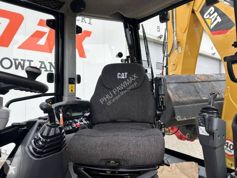 لودر حفار Caterpillar 2