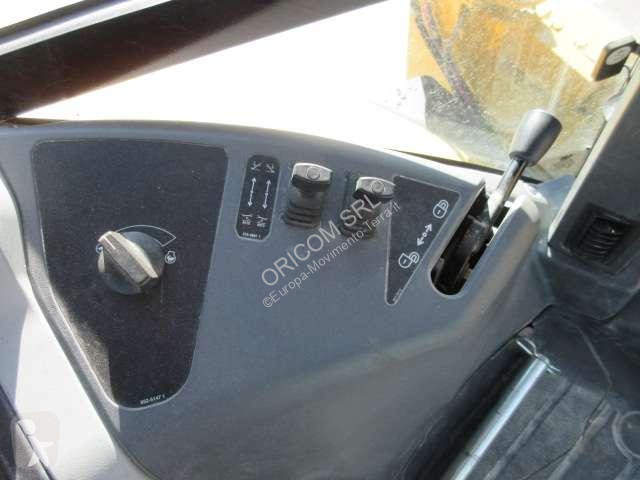 Traktor med grab Caterpillar 432