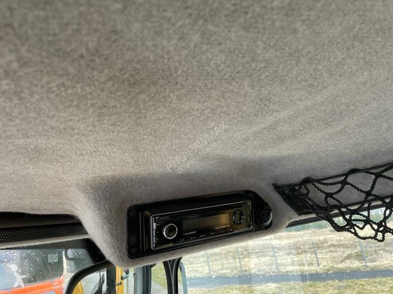 Traktor med grab Caterpillar 444 F2