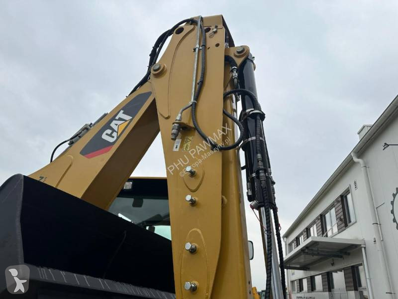 لودر حفار Caterpillar 2