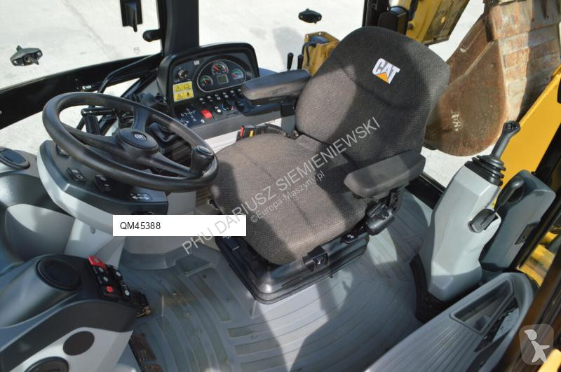 Traktor med grab Caterpillar 444F