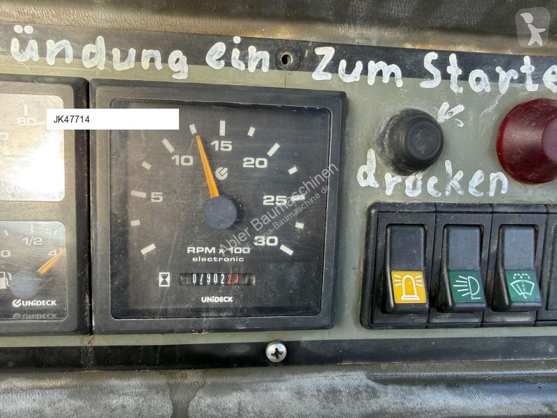 Traktor med grab Komatsu