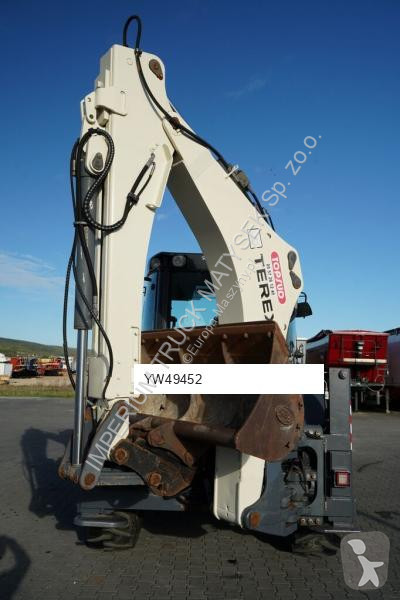 Traktor med grab Terex TLB 990