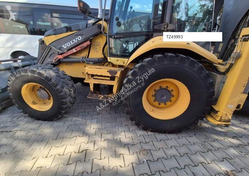 Traktor med grab Volvo