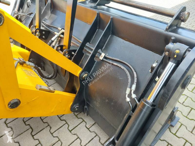 Traktor med grab JCB
