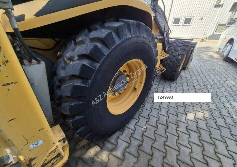 Traktor med grab Volvo