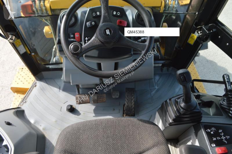 Traktor med grab Caterpillar 444F