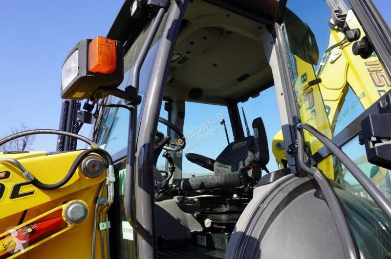 Bagr New Holland B 115 C backhoe loader / 1000...