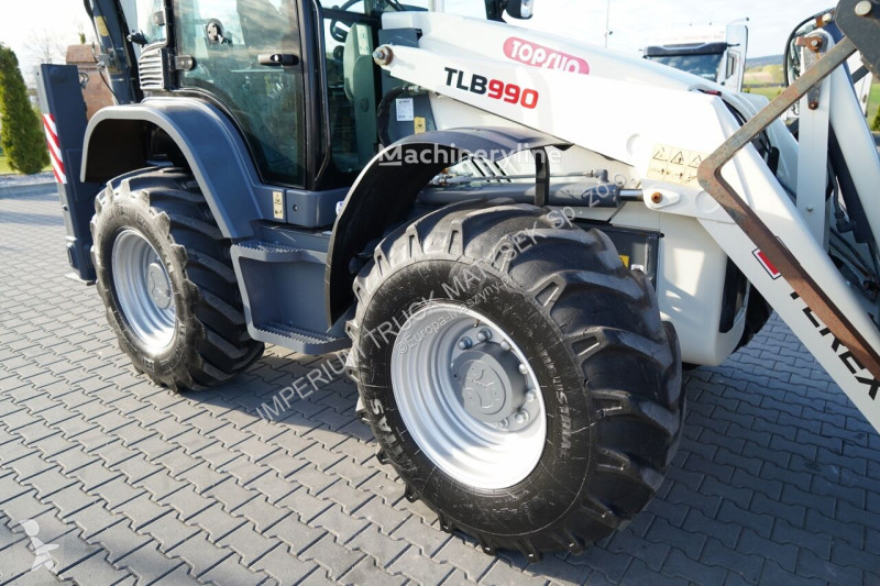 Traktor med grab Terex TLB 990
