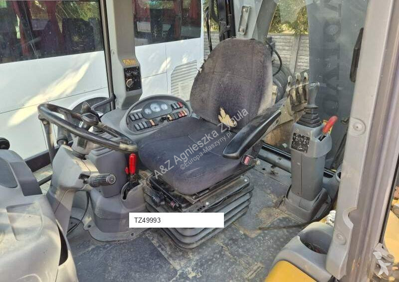 Traktor med grab Volvo
