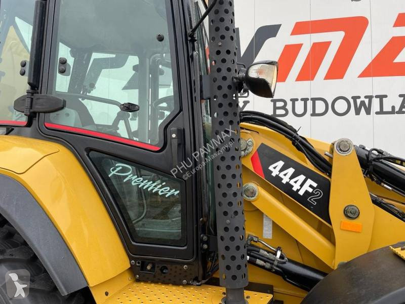 Traktor med grab Caterpillar 444 F2
