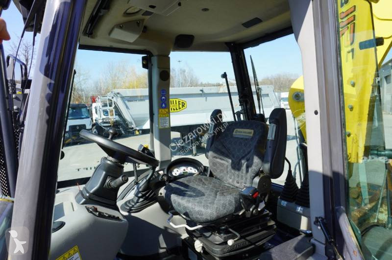 Bagr New Holland B 115 C backhoe loader / 1000...