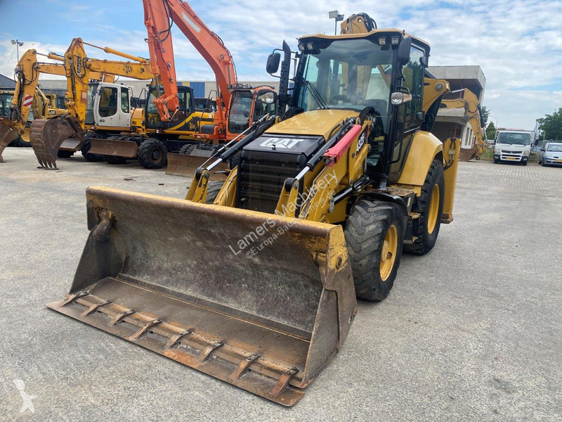 Traktor med grab Caterpillar 2 NVT