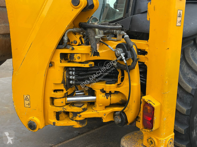 Traktor med grab JCB