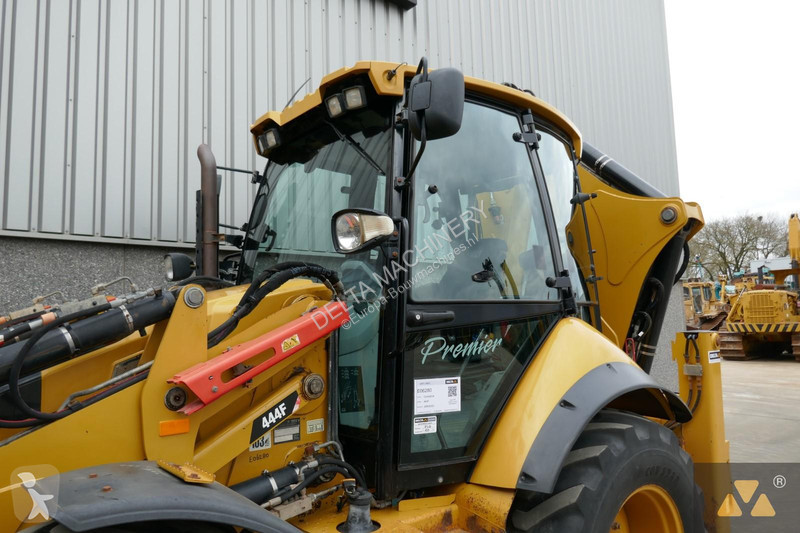 Traktor med grab Caterpillar 444F
