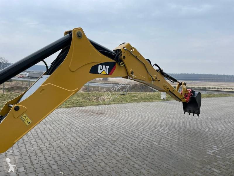 Traktor med grab Caterpillar 444 F2