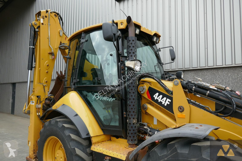 Traktor med grab Caterpillar 444F