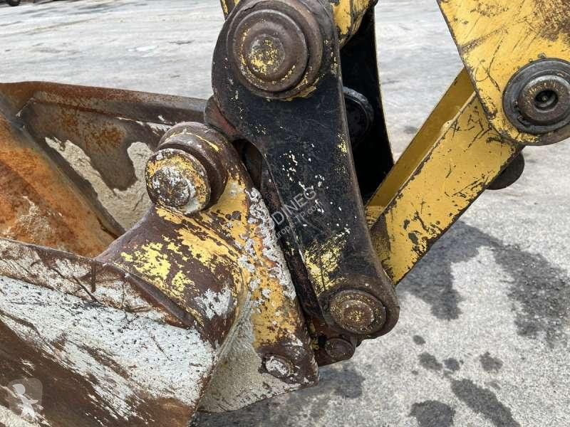 Traktor med grab Caterpillar