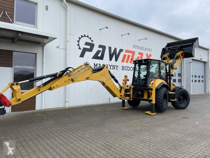 Traktor med grab Caterpillar 444 F2