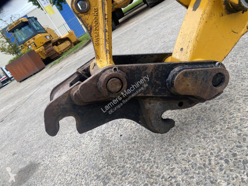 Traktor med grab Caterpillar 2 NVT