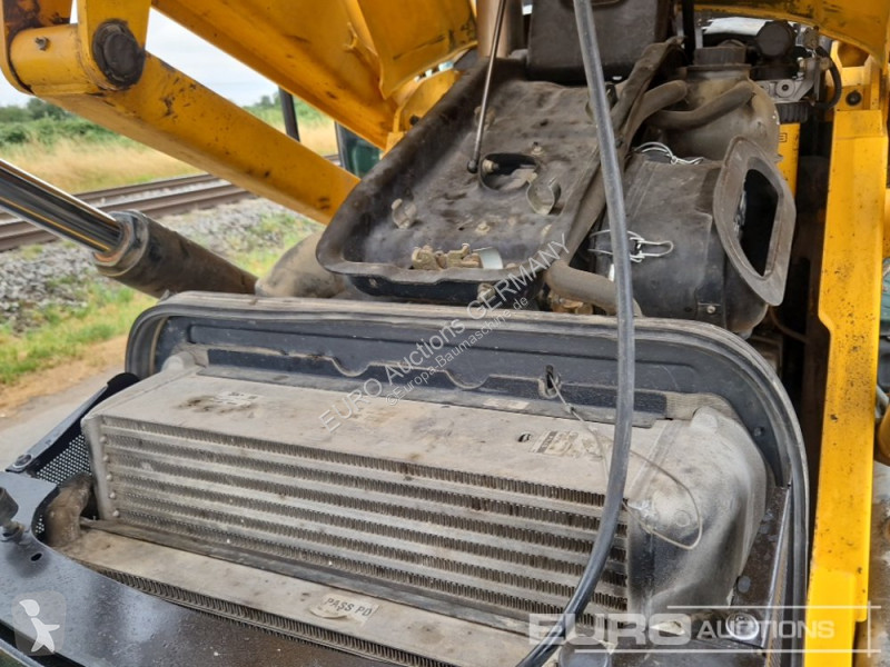 Traktor med grab JCB 3CX 14L4WM