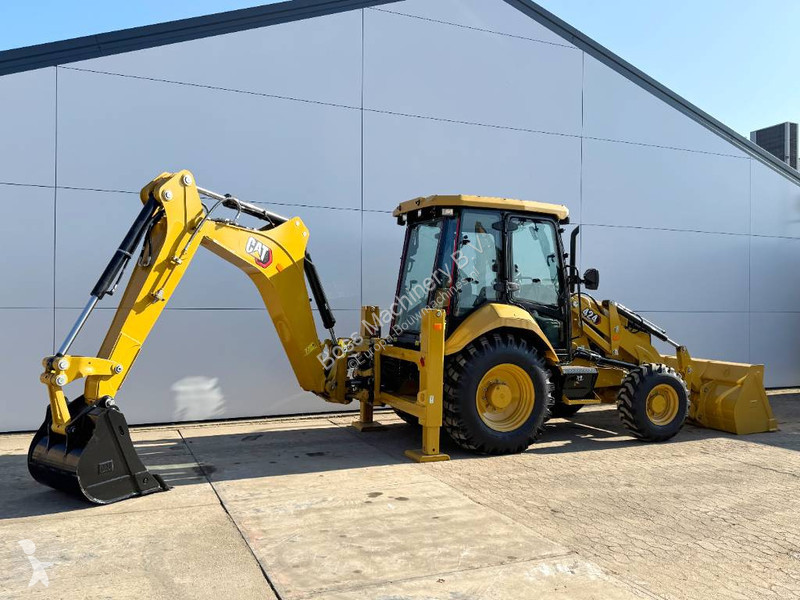 Traktor med grab Caterpillar 424 4WD - Hammer...