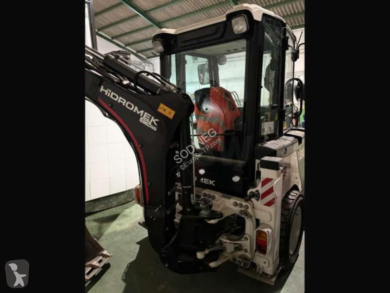 Traktor med grab Hidromek