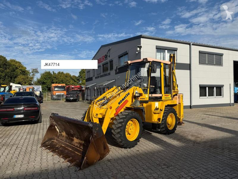 Traktor med grab Komatsu