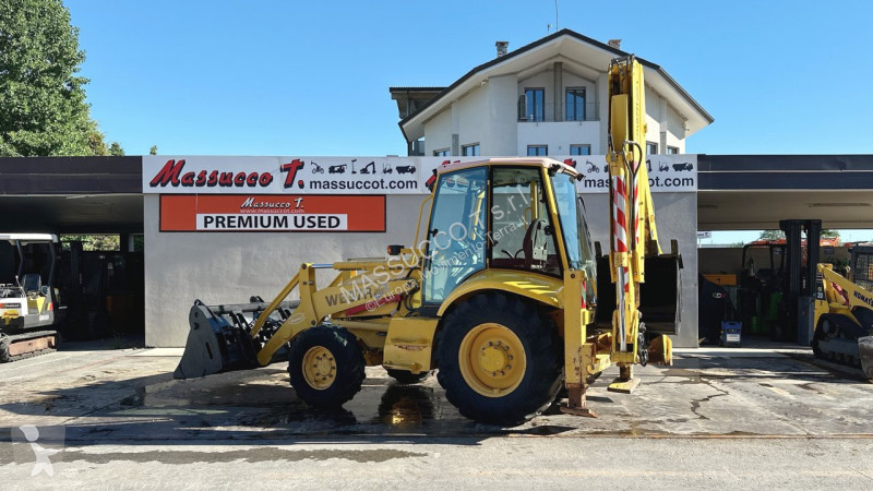 Traktor med grab Komatsu