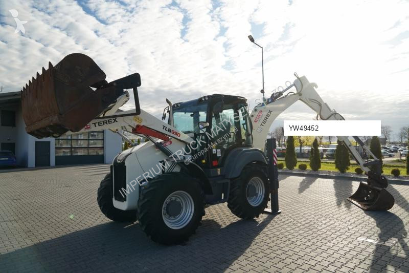 Traktor med grab Terex TLB 990