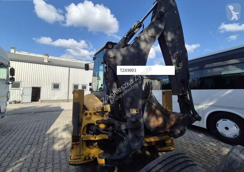 Traktor med grab Volvo