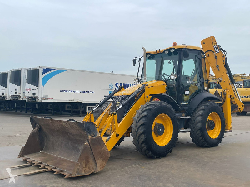 Traktor med grab JCB