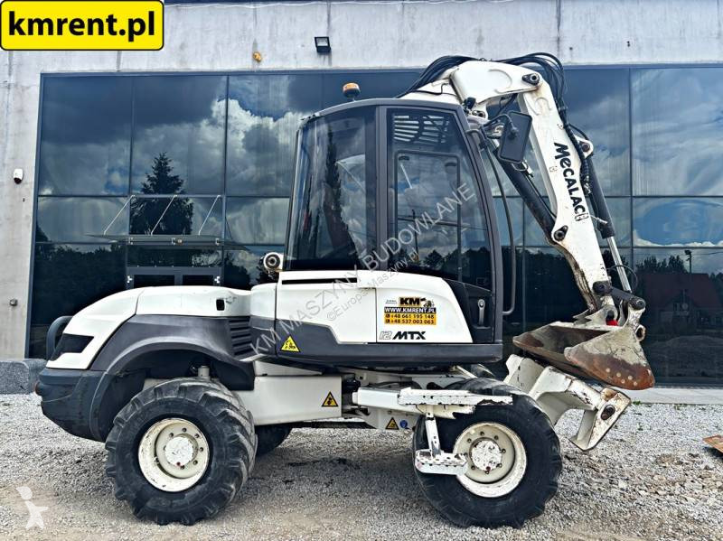 Багер-товарач Mecalac 12MTX KOPARKO-ŁADOWARKA...
