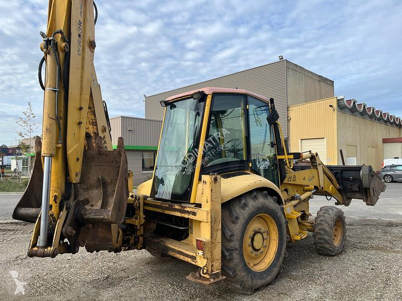 Buldoexcavator Komatsu