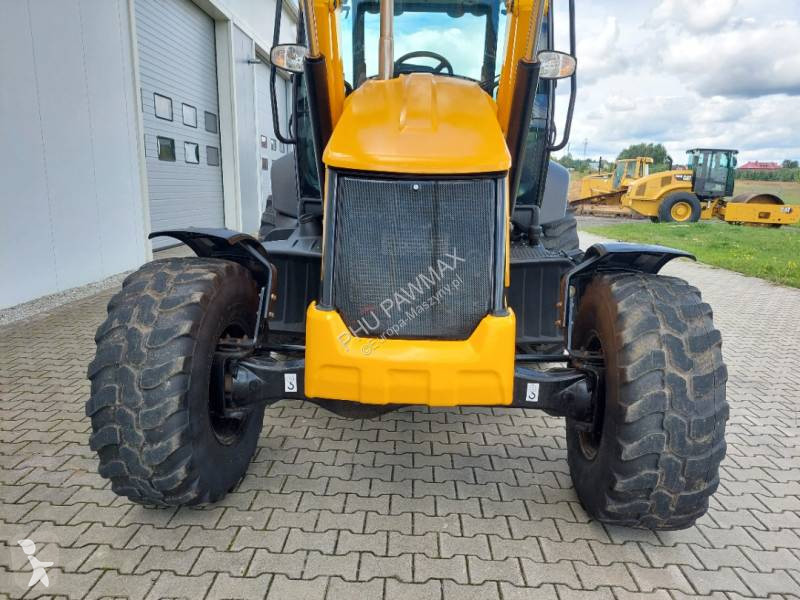 Traktor med grab JCB