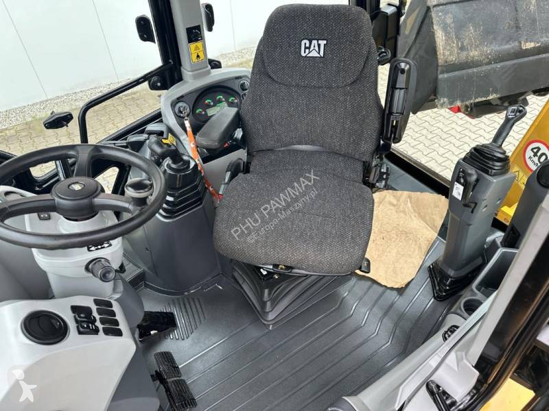 لودر حفار Caterpillar 2
