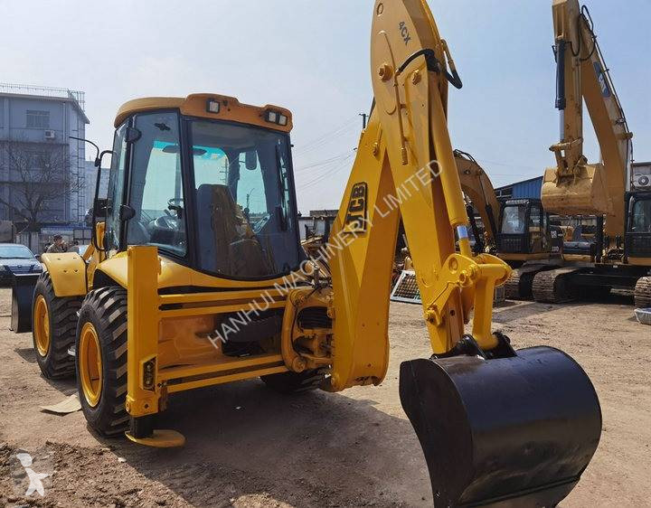 Traktor med grab JCB 4CX
