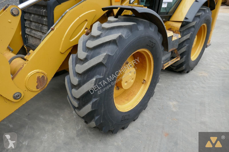 Traktor med grab Caterpillar 444F